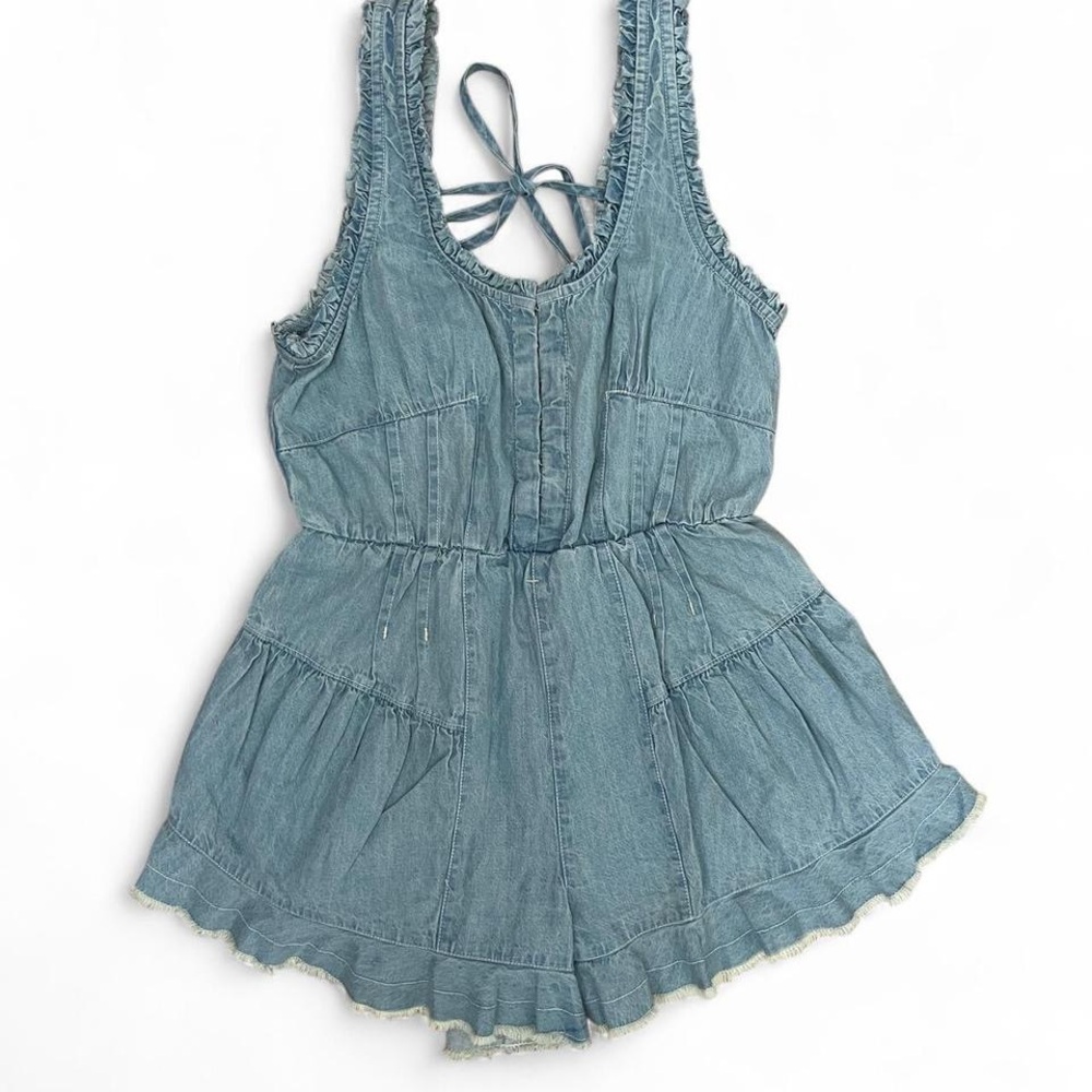 Free People light blue ruffled denim romper | tie back | frayed hem - size S